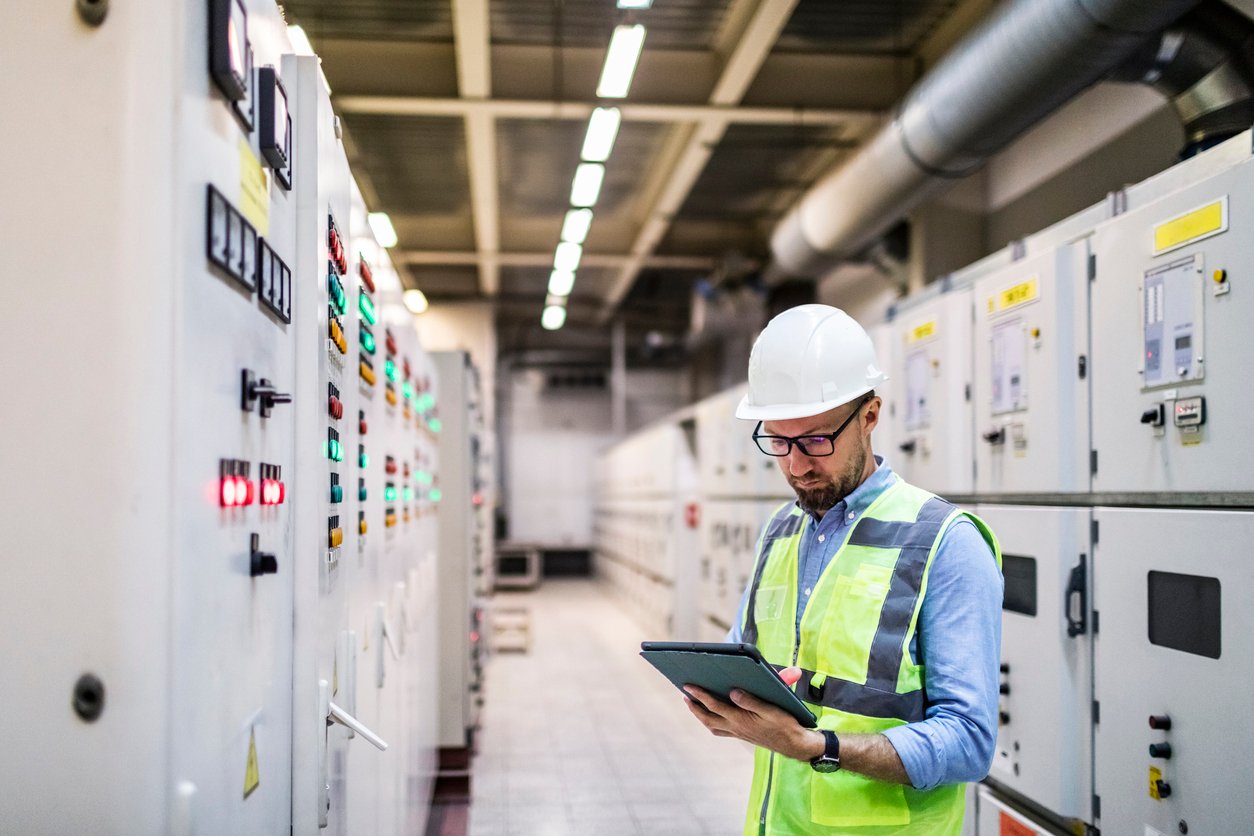 Electrician with tablet